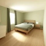 A bedroom with an accent color, featuring wooden floors and a soft blue rug under the bed. The room includes a white chest of drawers on one side, grey curtains at a large window on another wall, a modern black frame for the headboard, and a colorful painting above it. A small nightstand is placed near the bedside table. Bright LED lights hang from the ceiling. Rendered in Blender software, capturing the natural light coming through the windows. --ar 101:80 --style raw --profile d7lhgju ui77ksb drbewcy --dref https://s.mj.run/5q3zpLYt99E --stylize 350 --v 6.1 Job ID: 5cb9a1a3-0b59-40e0-aed2-4c62706ebba2